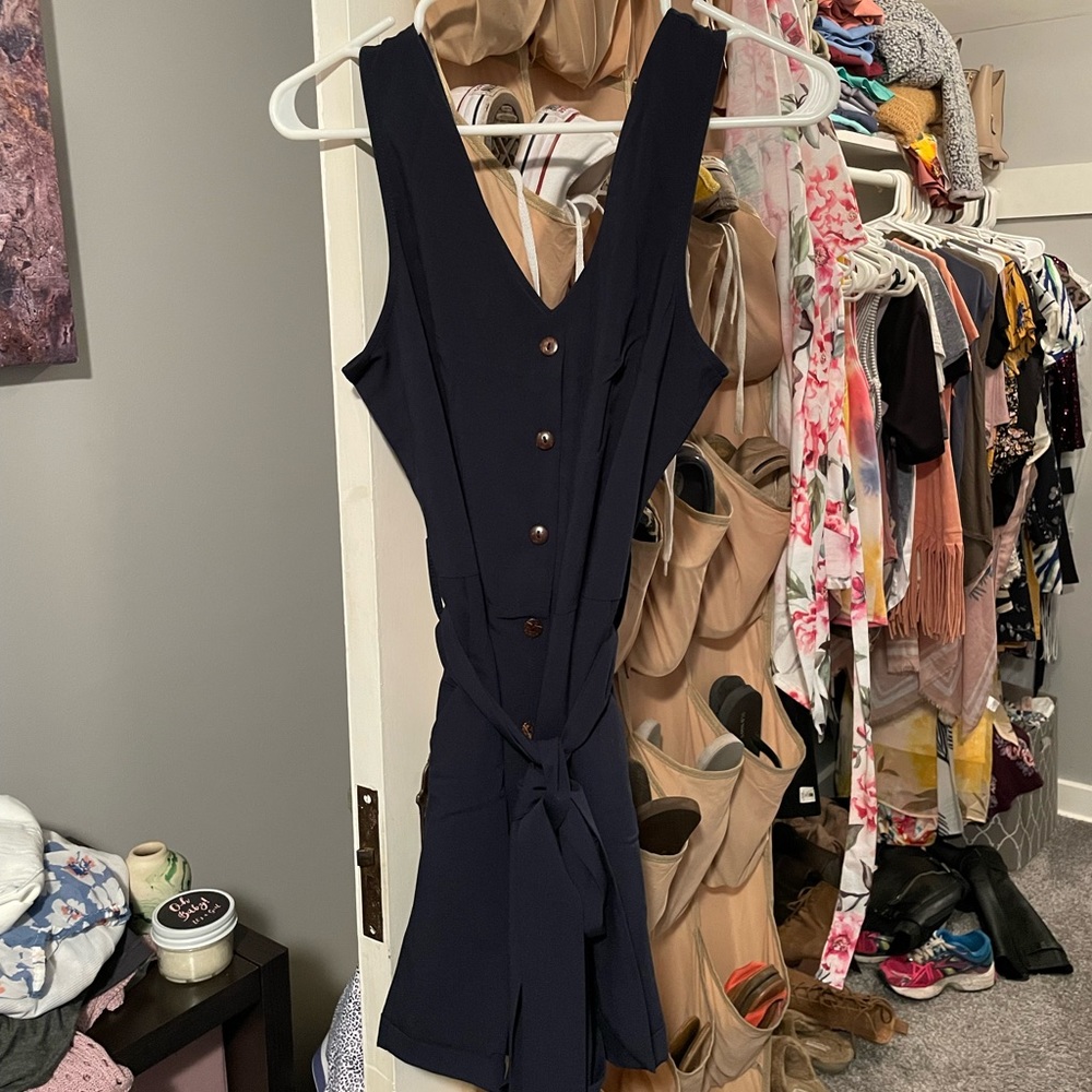 Never worn navy blue romper.